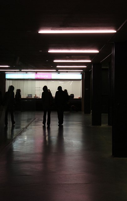 Muted lighting - a walkway inside the Tate Modern.