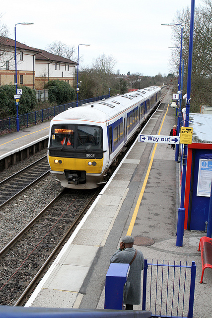 165031 calls at Northolt Park station with the 13:54 service to Marylebone from High Wycombe