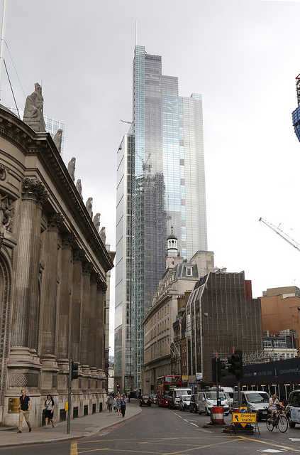 Heron Tower - designed by Kohn Pedersen Fox - looms over Bishopsgate and reflects work in progress on The Pinnacle.