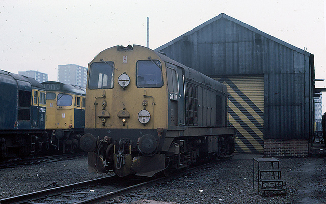 Eastfield TMD - 20117 sits on shed between duties in 1976.   A few class 20's remain in service but not this one.   Eastfield TMD which opened in 1904 was closed in 1992 and demolished.  It rose again from the ashes as a new maintenance  shed for the units on the Glasgow - Edinburgh route in 2004.