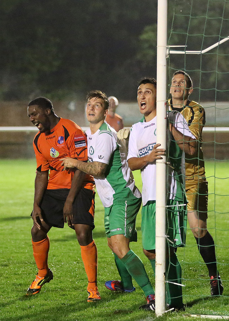 I do believe the Defender is tickling Leon to put him off!