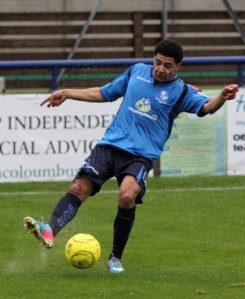 Dean Mason puts in the cross for the 1st goal after getting to Mark Henry's speculative pass. Note the spray from the standing water underfoot.