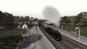 45586 'Mysore' accelerates a partially fitted freight out of Dumfries