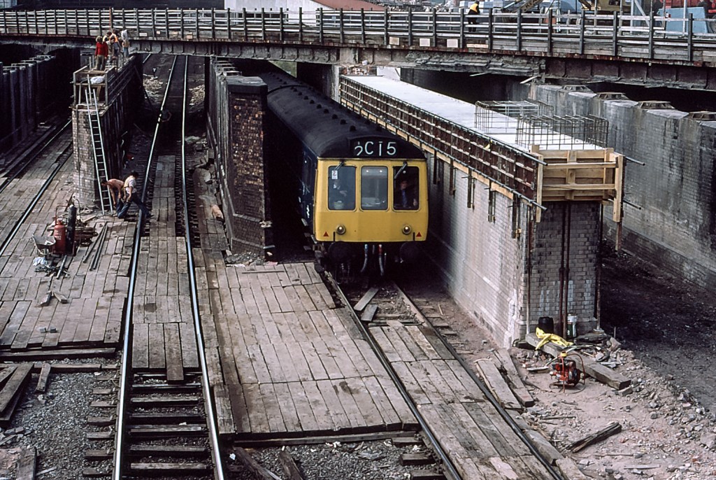 A local service from Bedford pases under the North London Line on its way to St Pancras.